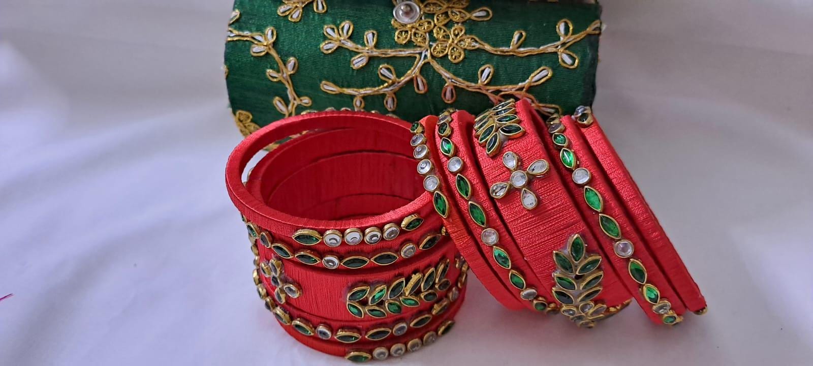 Red colour traditional thread kundan bangles with zari bangle box