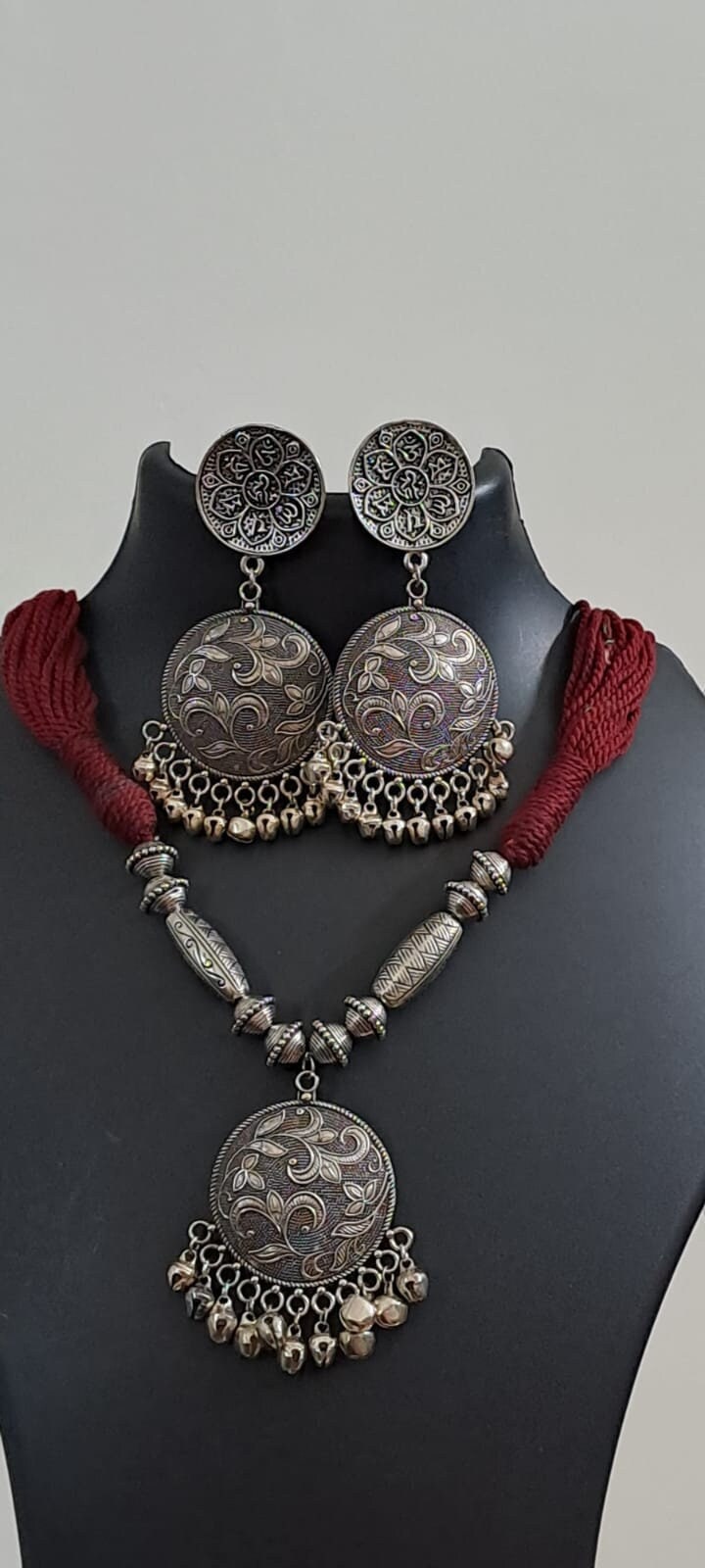Maroon thread necklace with silver oxidised traditional pendant