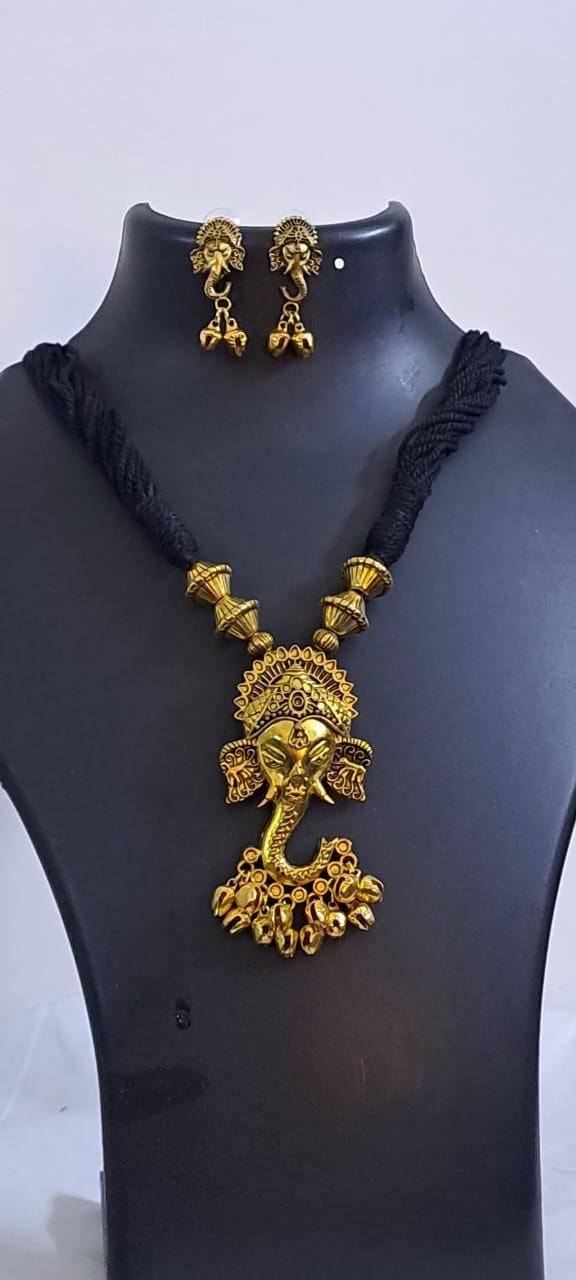 Black thread necklace with Golden oxidised traditional pendant