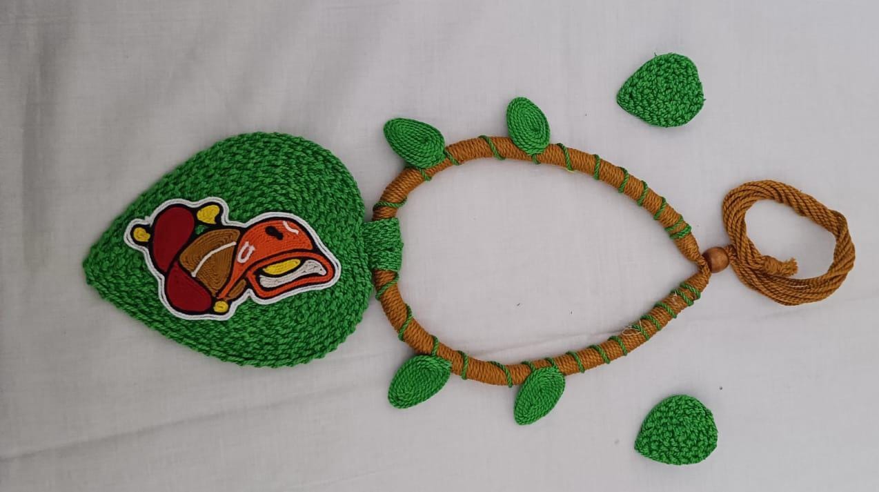 Exclusive light green and brown  thread necklace with leaf shaped  Ganesha pendant  and matching earrings.
