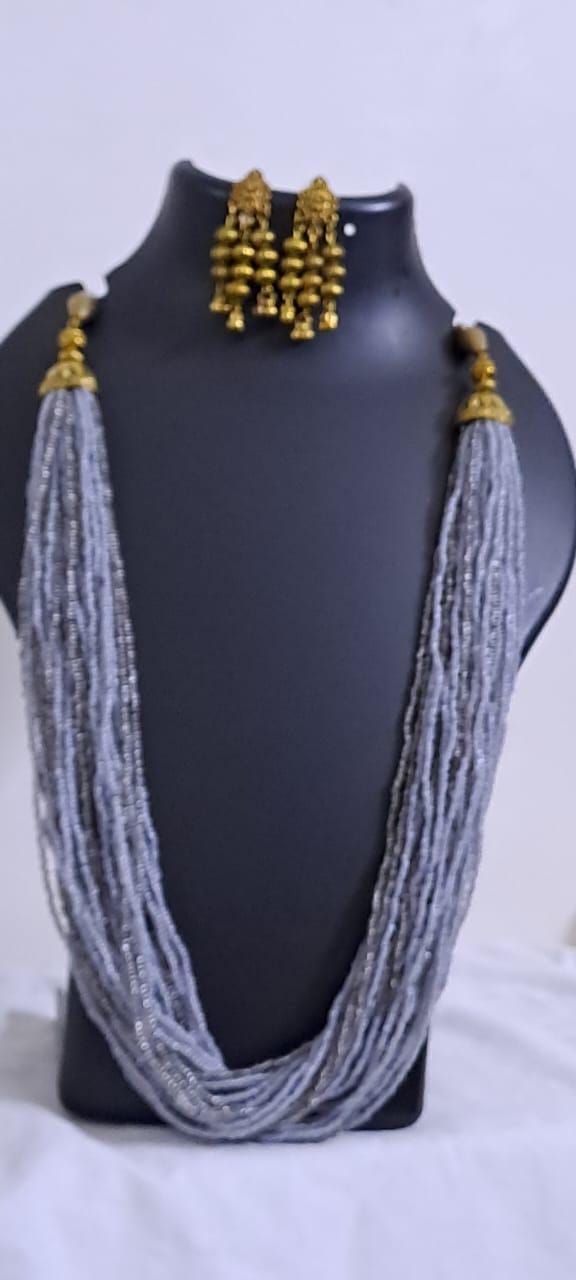 Exclusive multi layered  grey glass beads necklace set with golden oxidised matching earrings