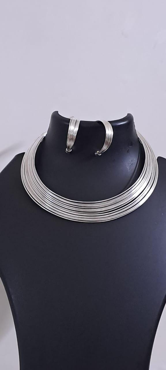 Exclusive multi layered  wired silver oxidised neckband with matching earrings, bracelet n ring