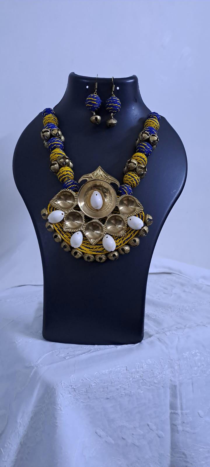 Blue yellow thread beads necklace set with dokra pendant n matching earrings