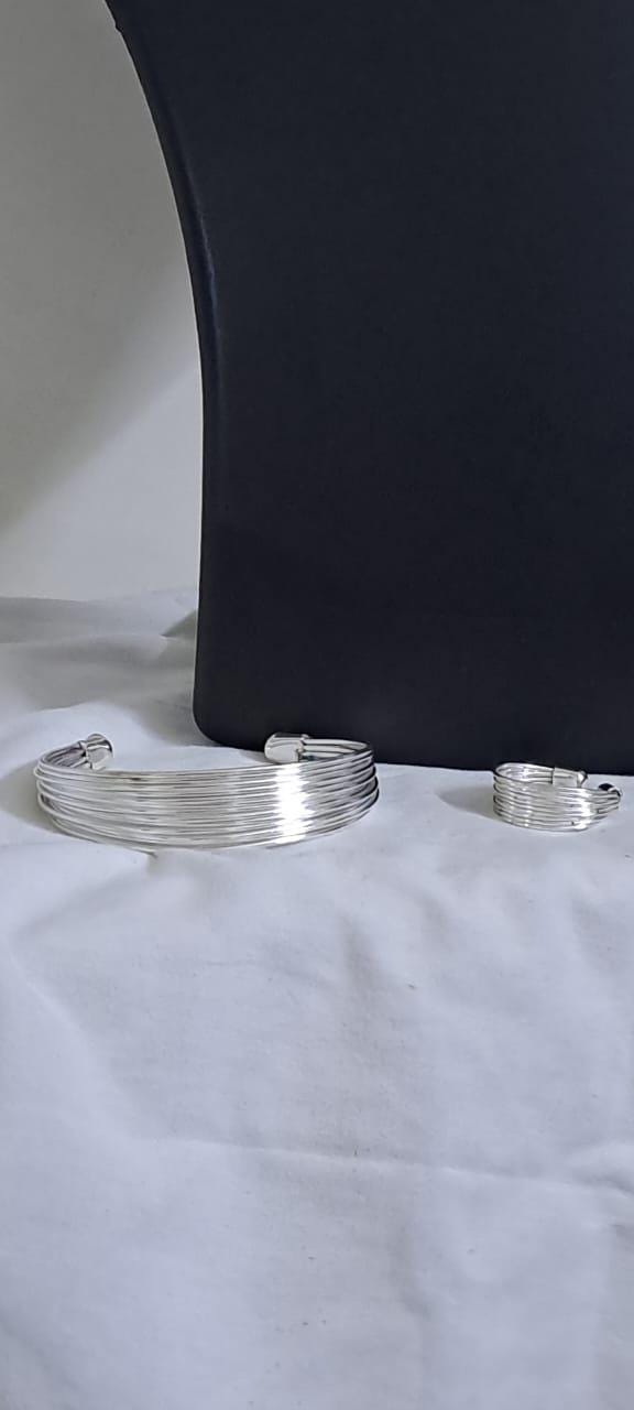 Exclusive multi layered  wired silver oxidised neckband with matching earrings, bracelet n ring