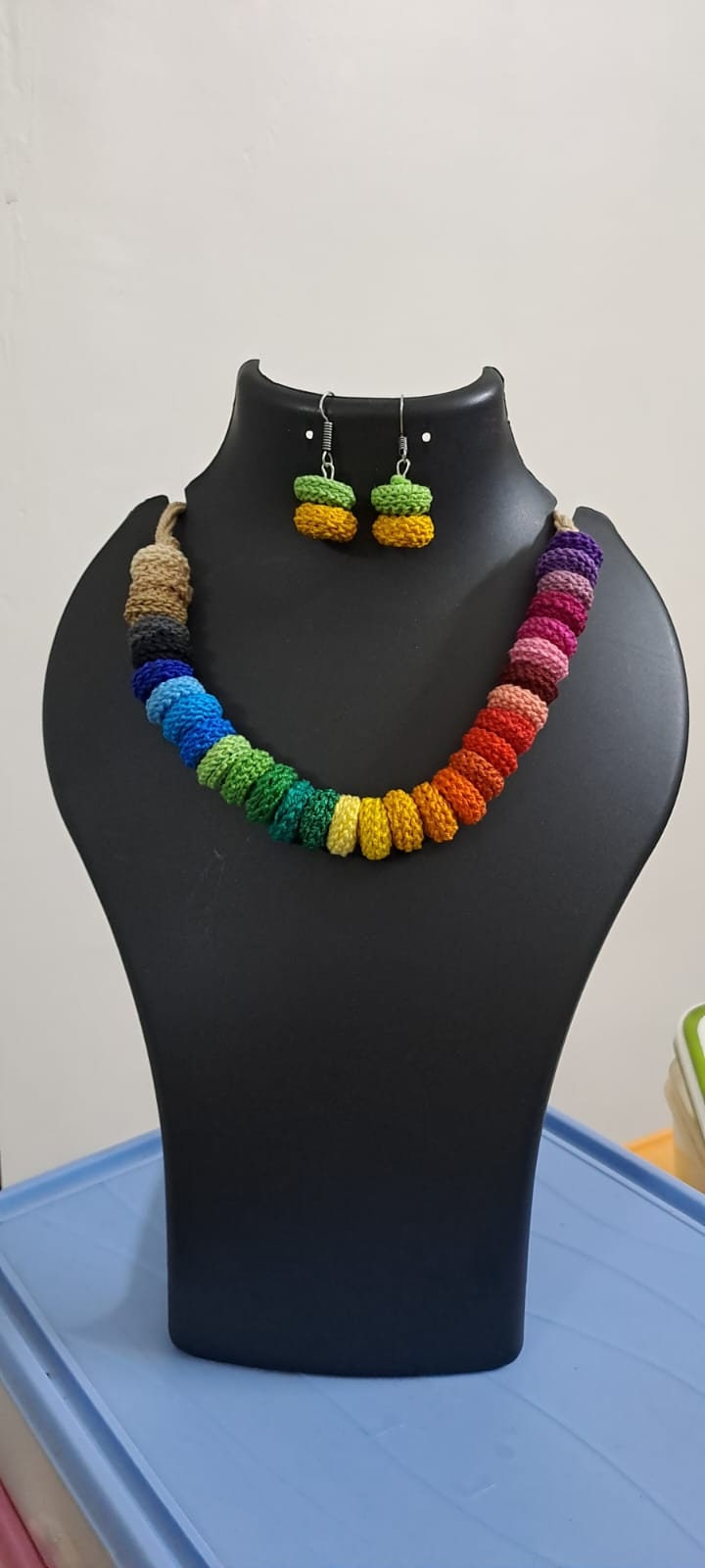 Exclusive multi coloured crochet necklace with colouful matching earrings.