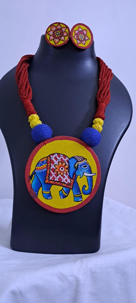 Handpainted fabric jewellery set with matching earrings