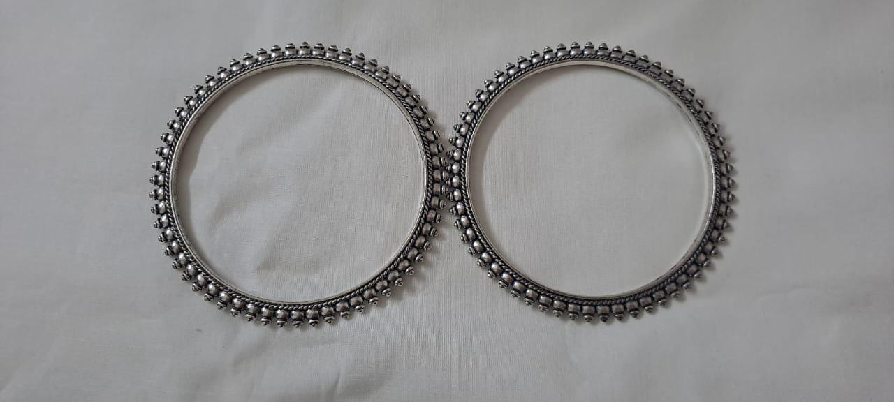 Traditional silver oxidised bangles