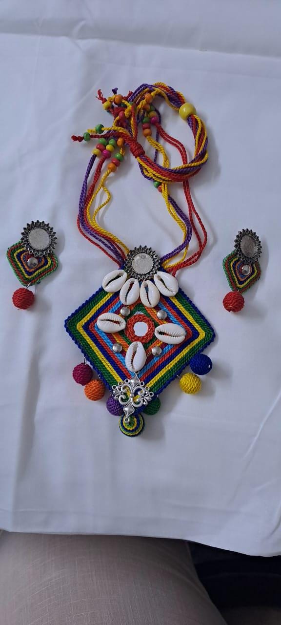 Exclusive multicoloured thread necklace set with shell n thread pendant n matching earrings