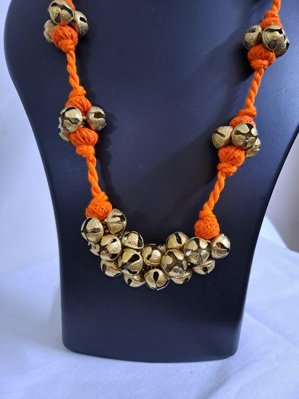 Orang thread necklace set with trinkets n matching earrings