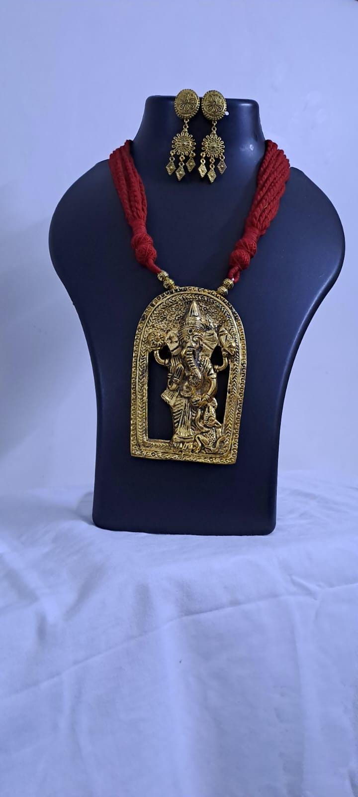 Maroon thread necklace with golden oxidised ganesha pendant