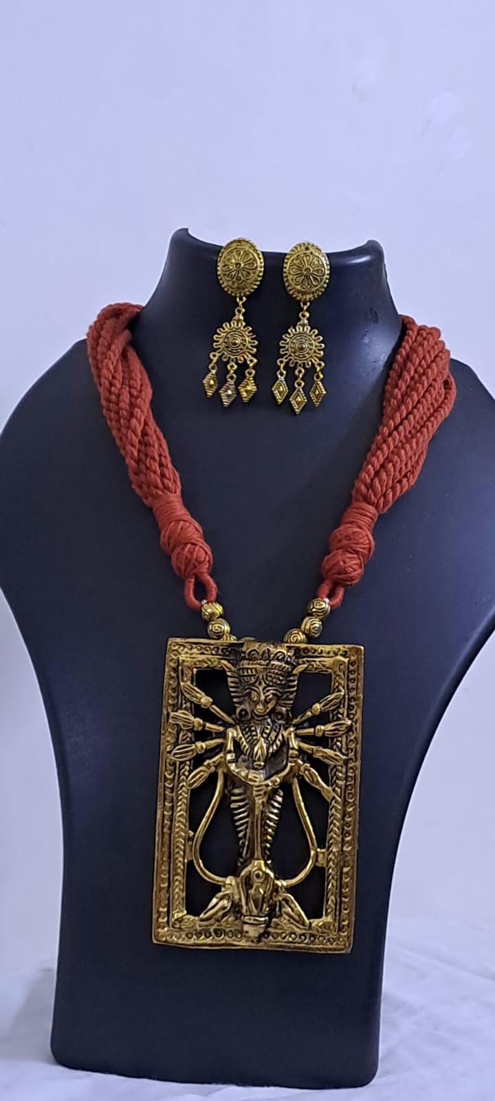 Brown  thread necklace with oxidised golden durga pendant