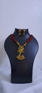 Red thread necklace with Golden oxidised traditional pendant