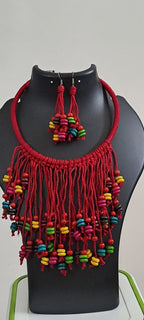 Exclusive red thread neckband with fringes and matching earrings.