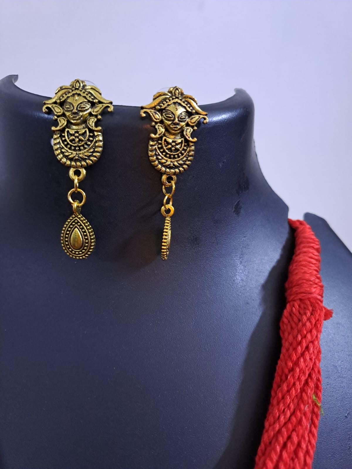 Red thread jewellery set with golden durga pendant n matching earrings