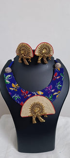 Unique fabric n thread necklace set with golden oxidised pendant and matching earrings