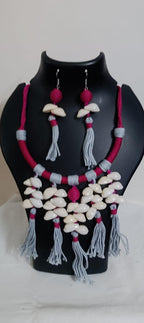 Exclusive pink n grey hasuli thread necklace set with shell fringes n matching earrings