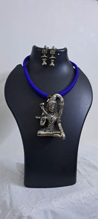 Blue thread necklace with silver oxidised lord shivji pendant