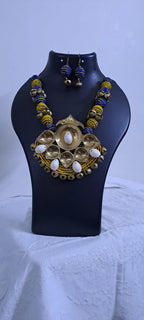 Blue yellow thread beads necklace set with dokra pendant n matching earrings