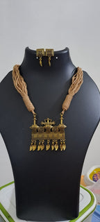 Peach thread necklace with Golden oxidised traditional pendant
