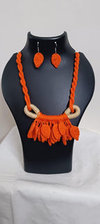 Orange Crochet thread necklace set with leaf fringes and matching earrings