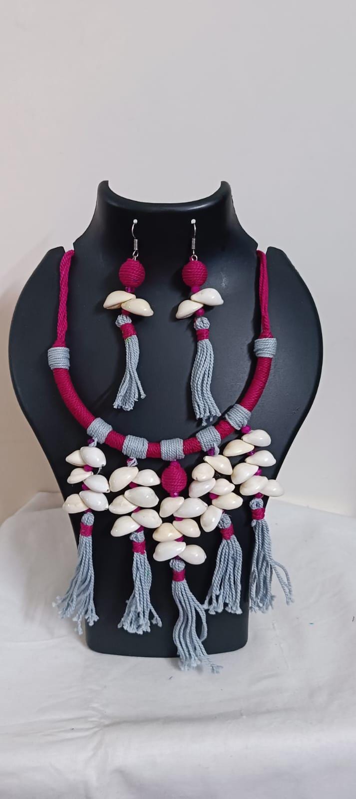 Exclusive pink n grey hasuli thread necklace set with shell fringes n matching earrings