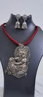 Maroon thread necklace with silver oxidised krishna pendant