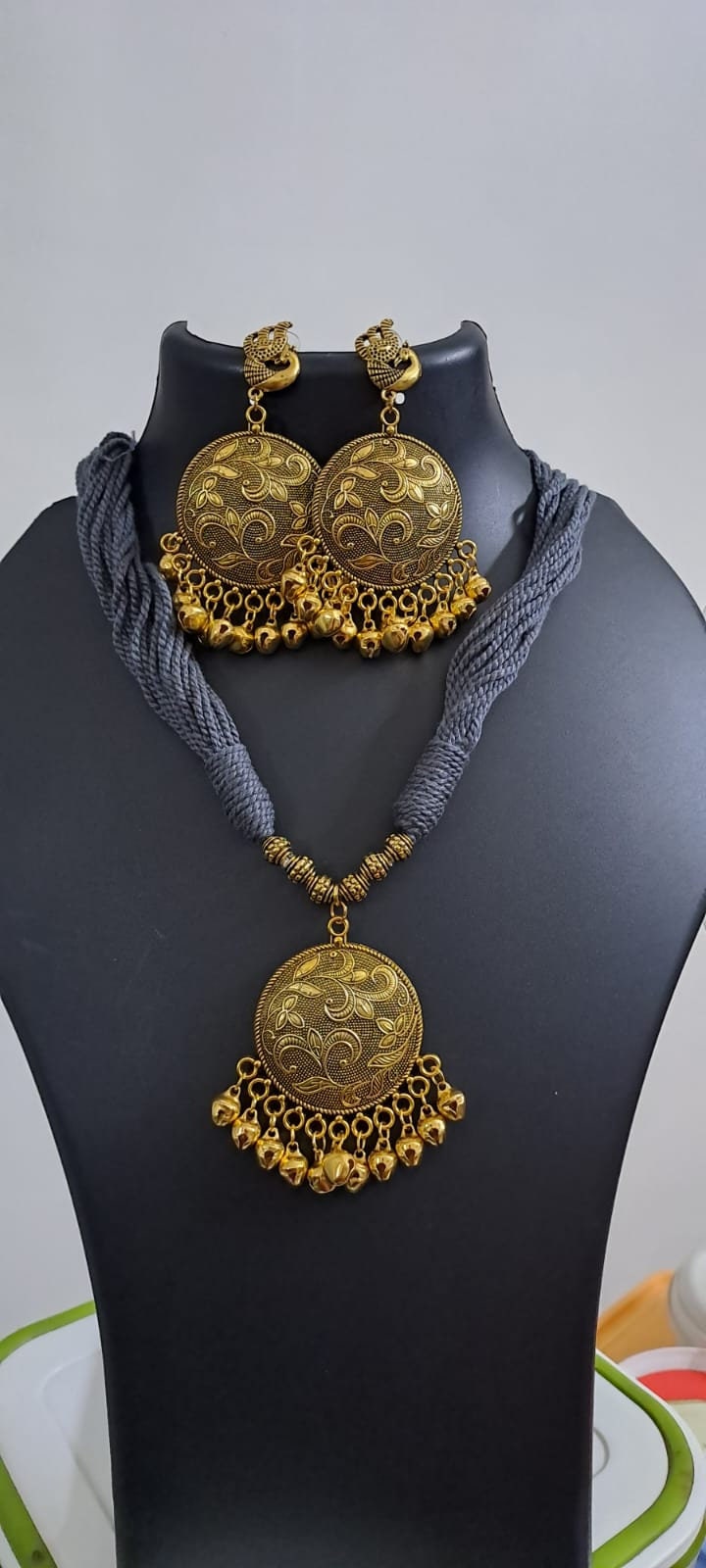 Grey thread necklace with Golden oxidised traditional pendant