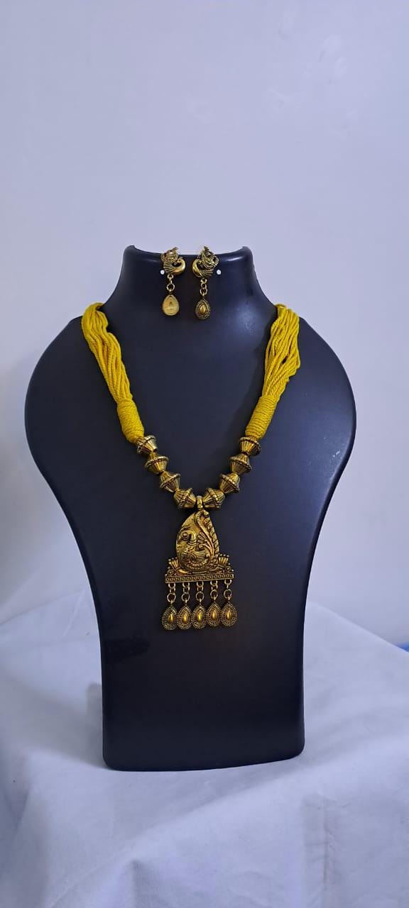 Yellow thread necklace with Golden oxidised traditional pendant