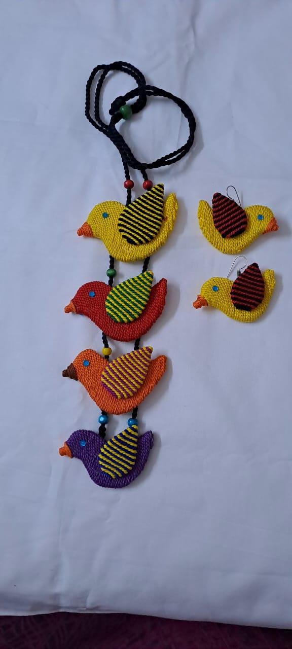 Multi coloured bird necklace and matching earrings
