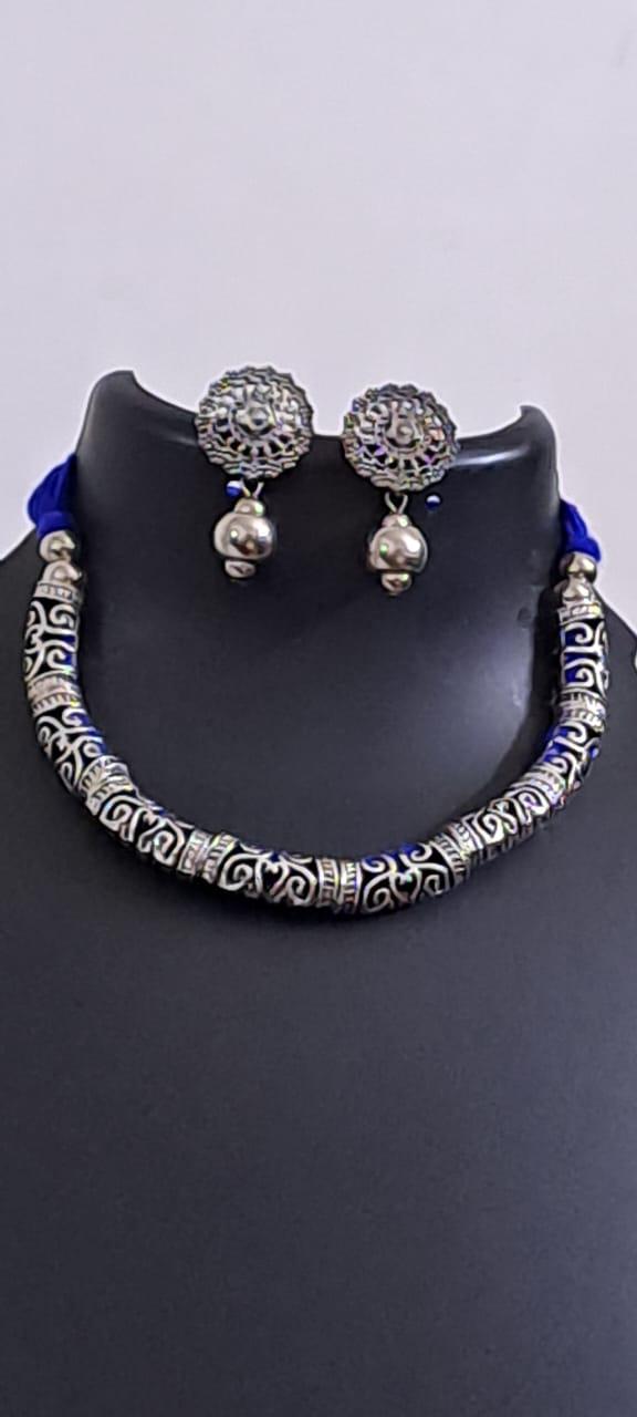 Exclusive silver oxidised hasuli set with matching earrings