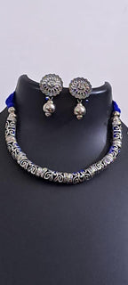 Exclusive silver oxidised hasuli set with matching earrings