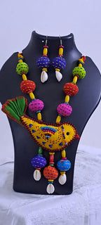 Exclusive fabric necklace with embroidered yellow fabric bird pendant and fabric beads n matching beads