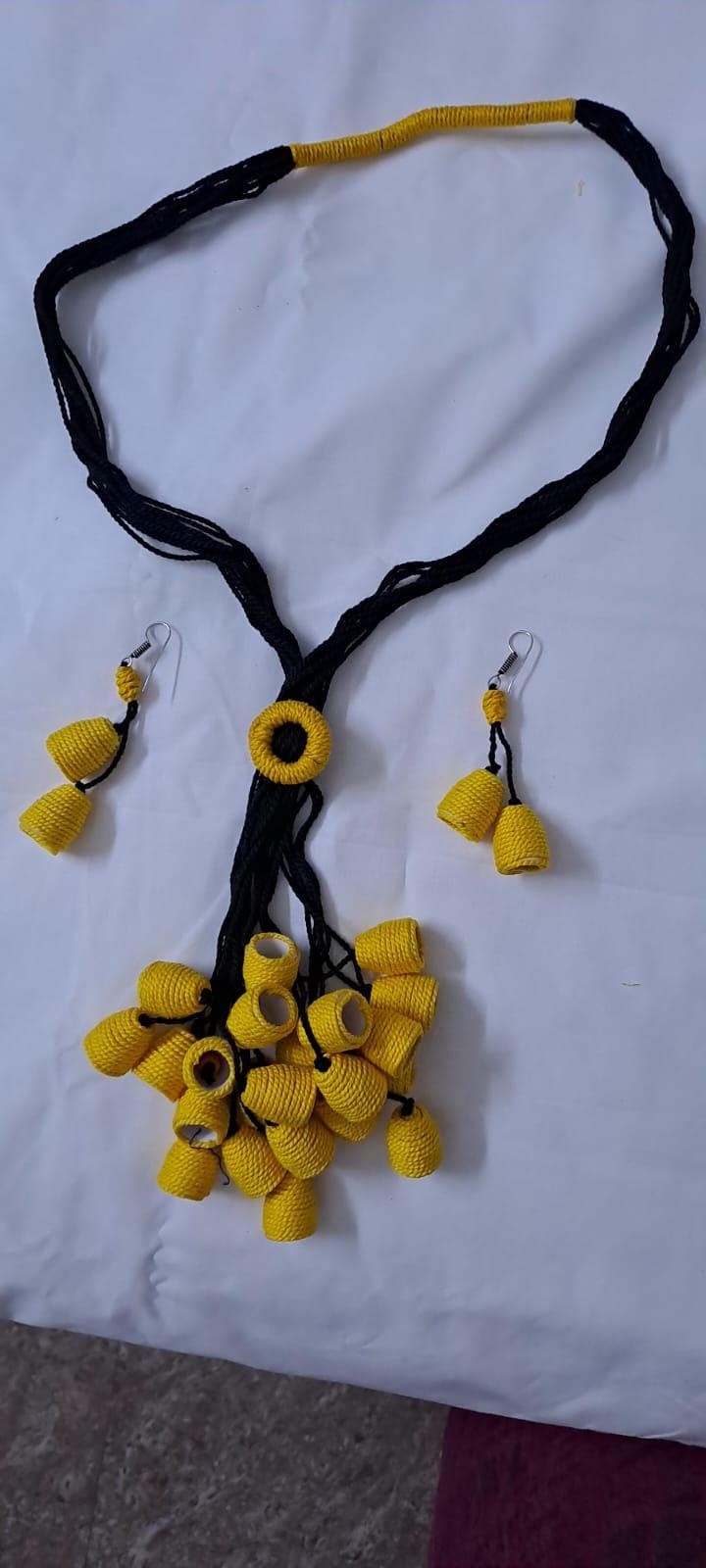 Yellow thread necklace with multiple thread aparajita flower fringes n matching earrings