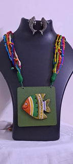 Terracotta fish pendant and thread necklace