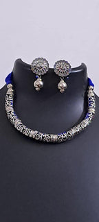 Exclusive silver oxidised hasuli set with matching earrings