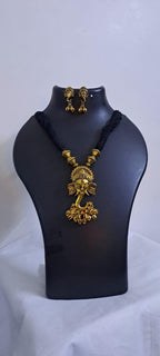 Black thread necklace with Golden oxidised traditional pendant