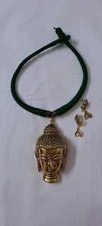 Green thread necklace with oxidised golden buddha pendant