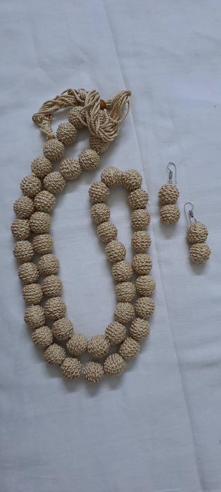 Exclusive beige colour thread beads long necklace set with matching earrings