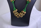 Green thread necklace set with trinkets n matching earrings