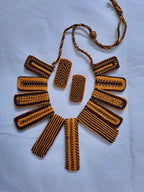 Exclusive brown n yellow thread necklace with rectangle shape thread beads and matching earrings.