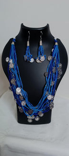 Exclusive multi-coloured and multi-layered thread necklace with silver oxidised charms