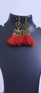 Golden neckband with red silk thread fringes and matching earrings
