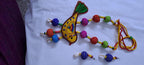 Exclusive fabric necklace with embroidered yellow fabric bird pendant and fabric beads n matching beads