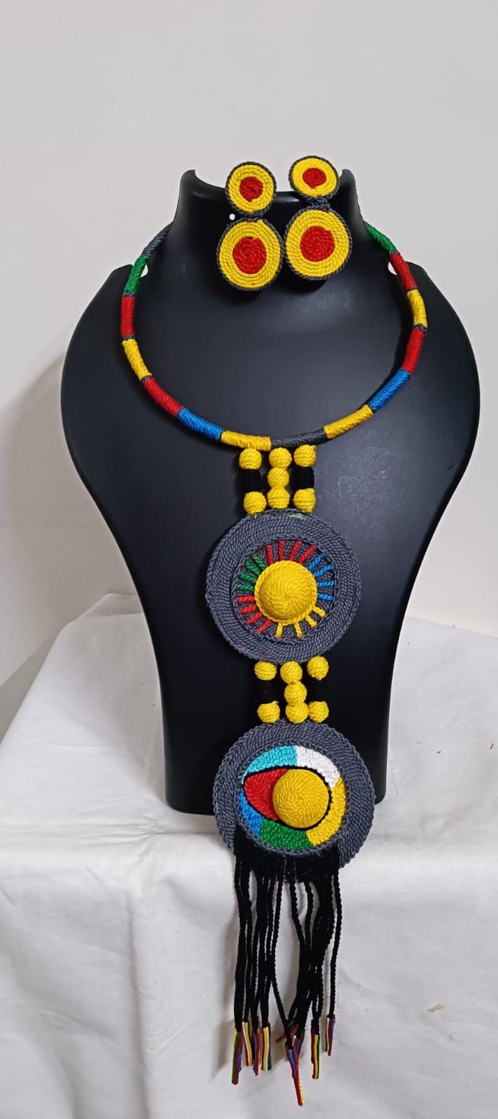 Exclusive multicoloured hasuli thread necklace set with round thread pendant n matching earrings