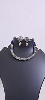Exclusive silver oxidised hasuli set with matching earrings