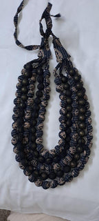 Exclusive multi-layered grey fabric necklace