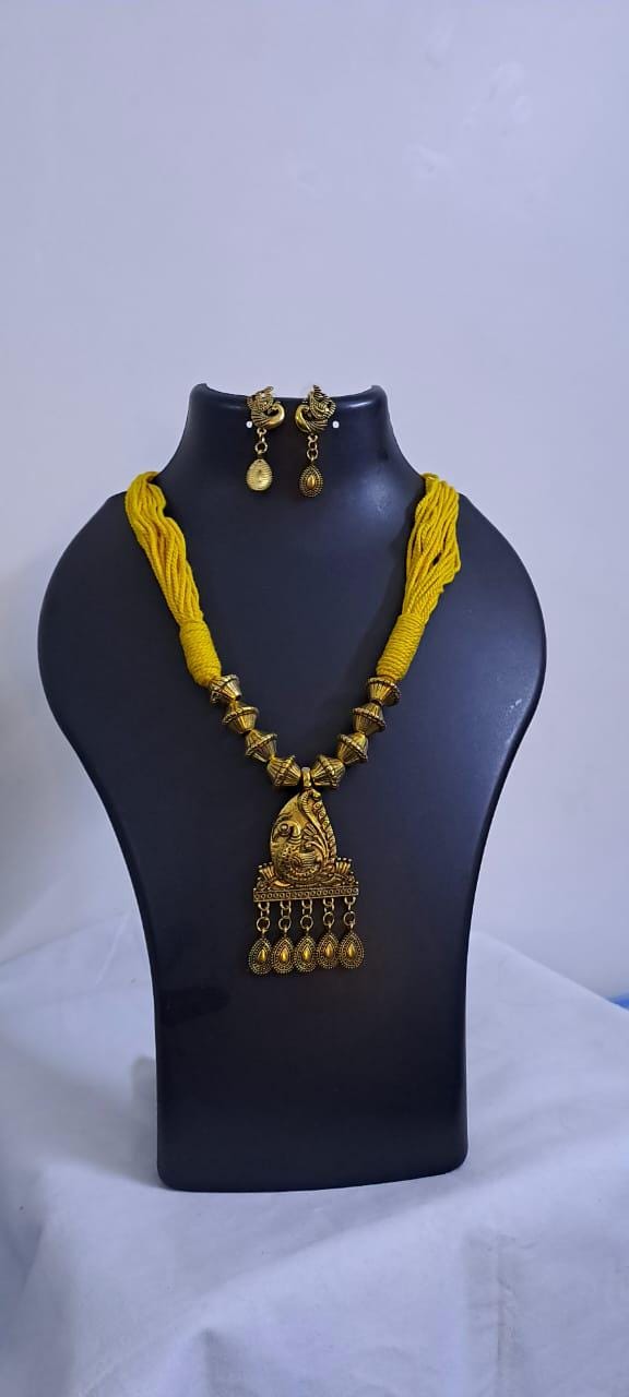 Yellow thread necklace with Golden oxidised traditional pendant