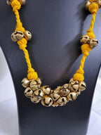 Yellow thread necklace with trinkets n matching earrings