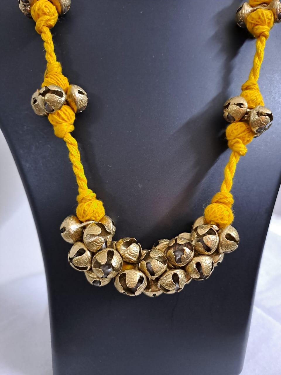 Yellow thread necklace with trinkets n matching earrings