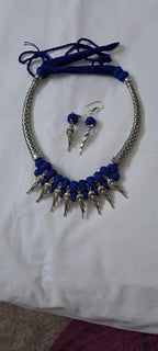 Blue thread necklace with kolhapuri silver oxidised traditional beads and matching earrings